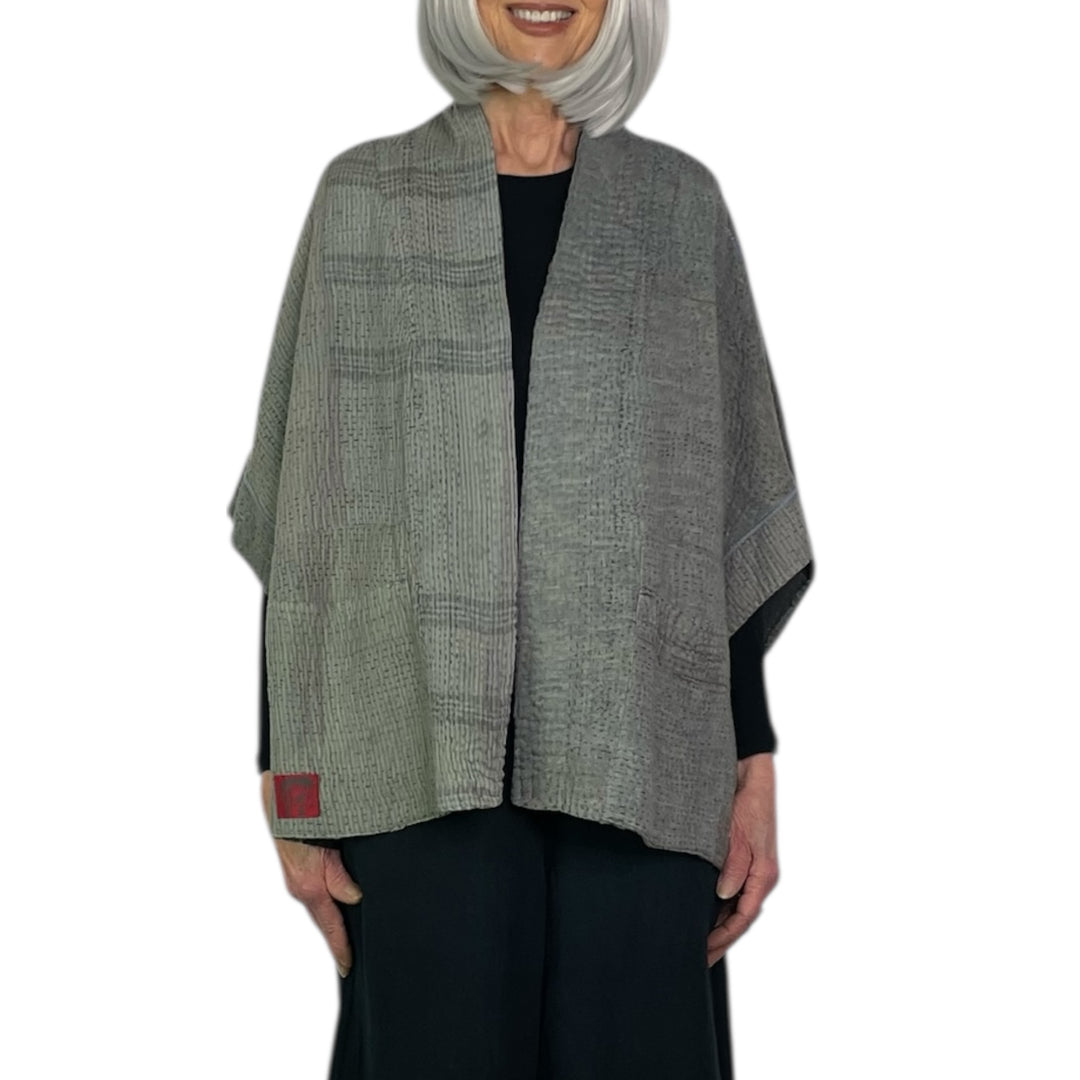FRAYED PATCH MINI PONCHO