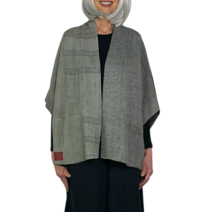 FRAYED PATCH MINI PONCHO