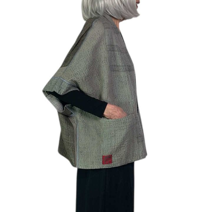 FRAYED PATCH MINI PONCHO