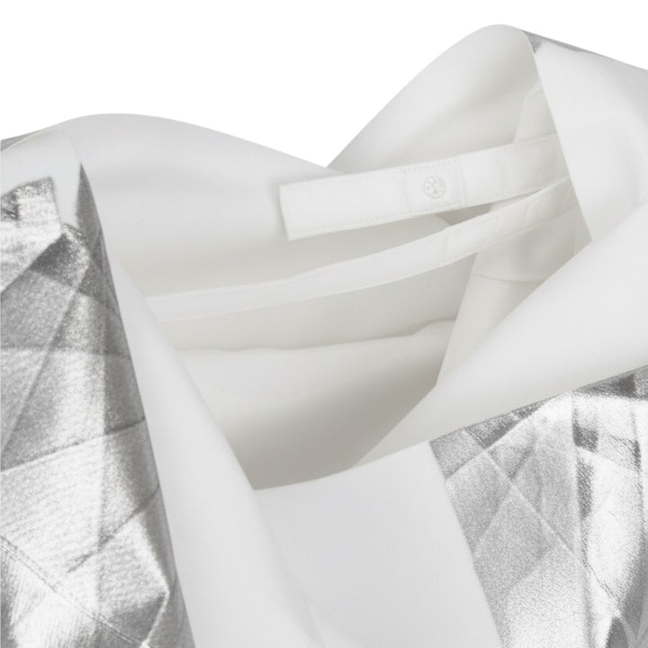 132 5. STANDARD FOIL SLEEVELESS TOP