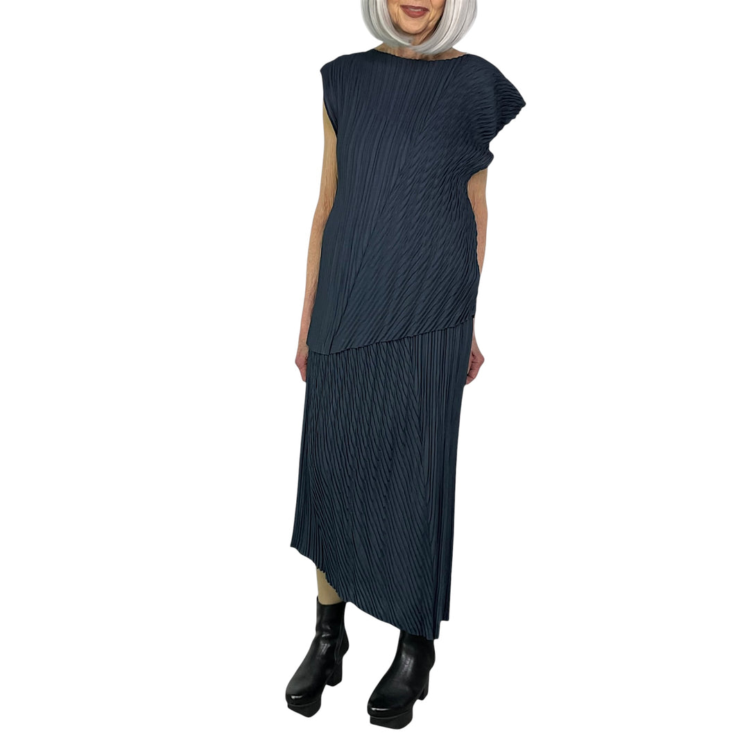 UNFURLING PLEATS SKIRT
